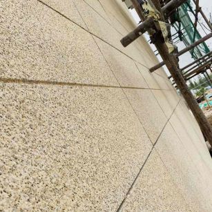 咸阳 黄金麻花岗岩荔枝面外墙干挂石材效果示例