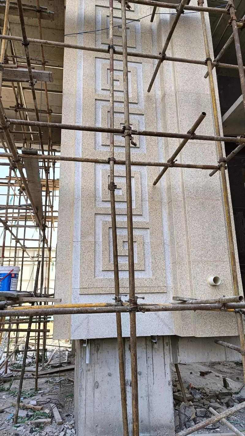 咸阳 黄金麻花岗岩别墅外墙干挂回纹造型效果